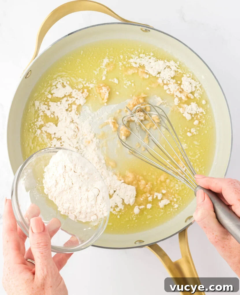 Creamy Baked Macaroni and Cheese Casserole Recipe 7 whisking flour into melted butter