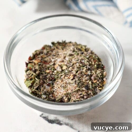 A small batch steak seasoning blend in a glass bowl on marble