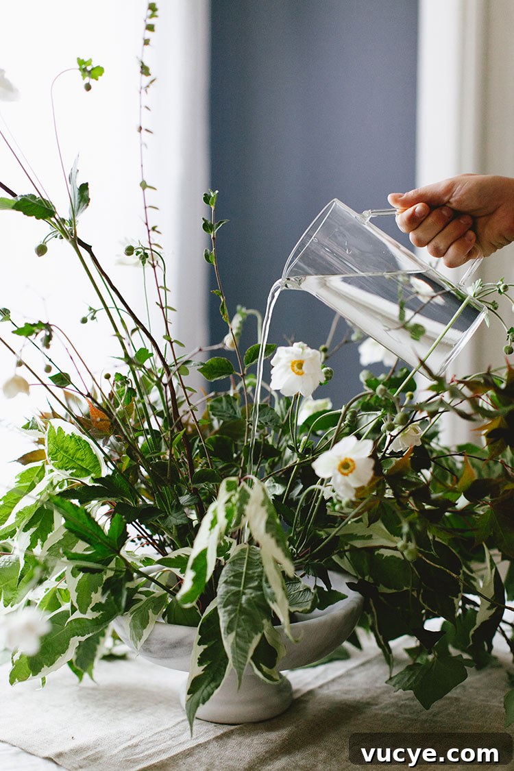 6 Elegant Ikebana Flower Arrangements for Timeless Decor 5 Ikebana Inspired Foraged Centerpiece from Jojotastic