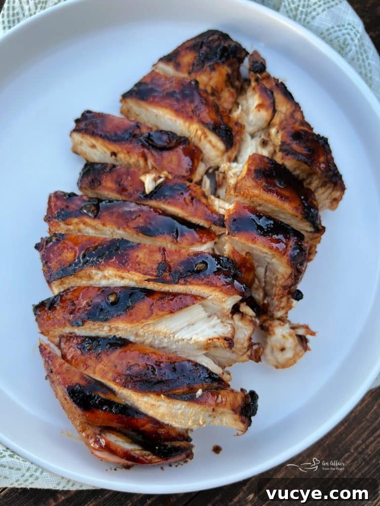 Sweet and Smoky Grilled Chicken Recipe for Weeknight Meals 4 Sliced chicken and sides