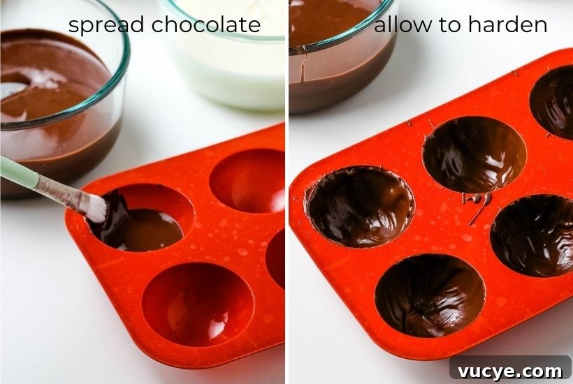 DIY Hot Chocolate Bombs Filled with Mini Marshmallows 5 spreading chocolate in the mold and letting them harden