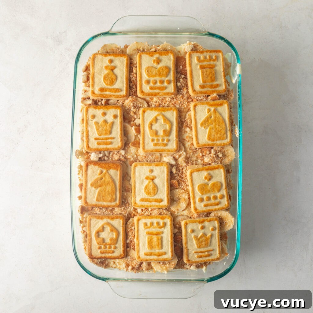 Southern Banana Pudding topped with a layer of chessmen cookies. 