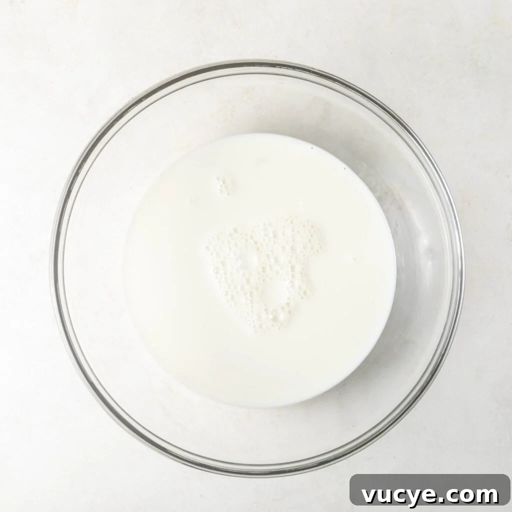 Glass mixing bowl with milk
