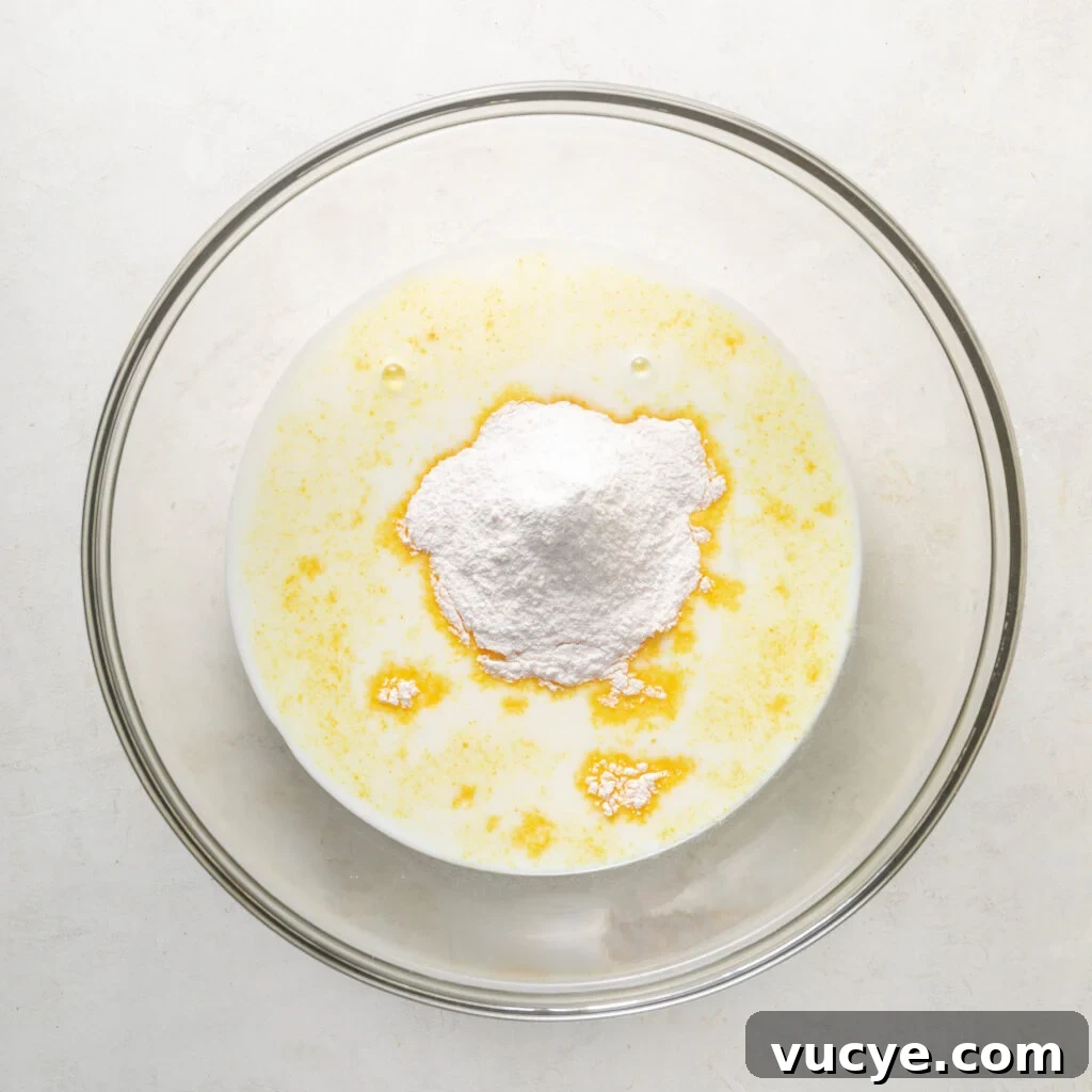 french vanilla pudding added to bowl of milk. 