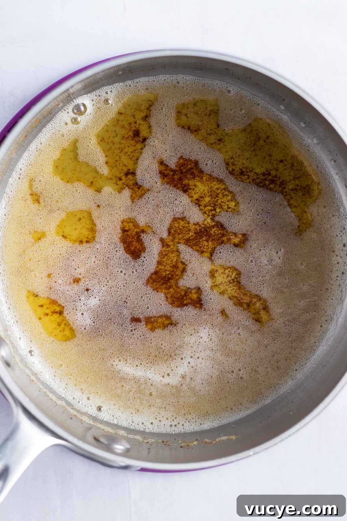 Moist Cardamom Cake Recipe with Warm Spices 9 brown butter in saucepan