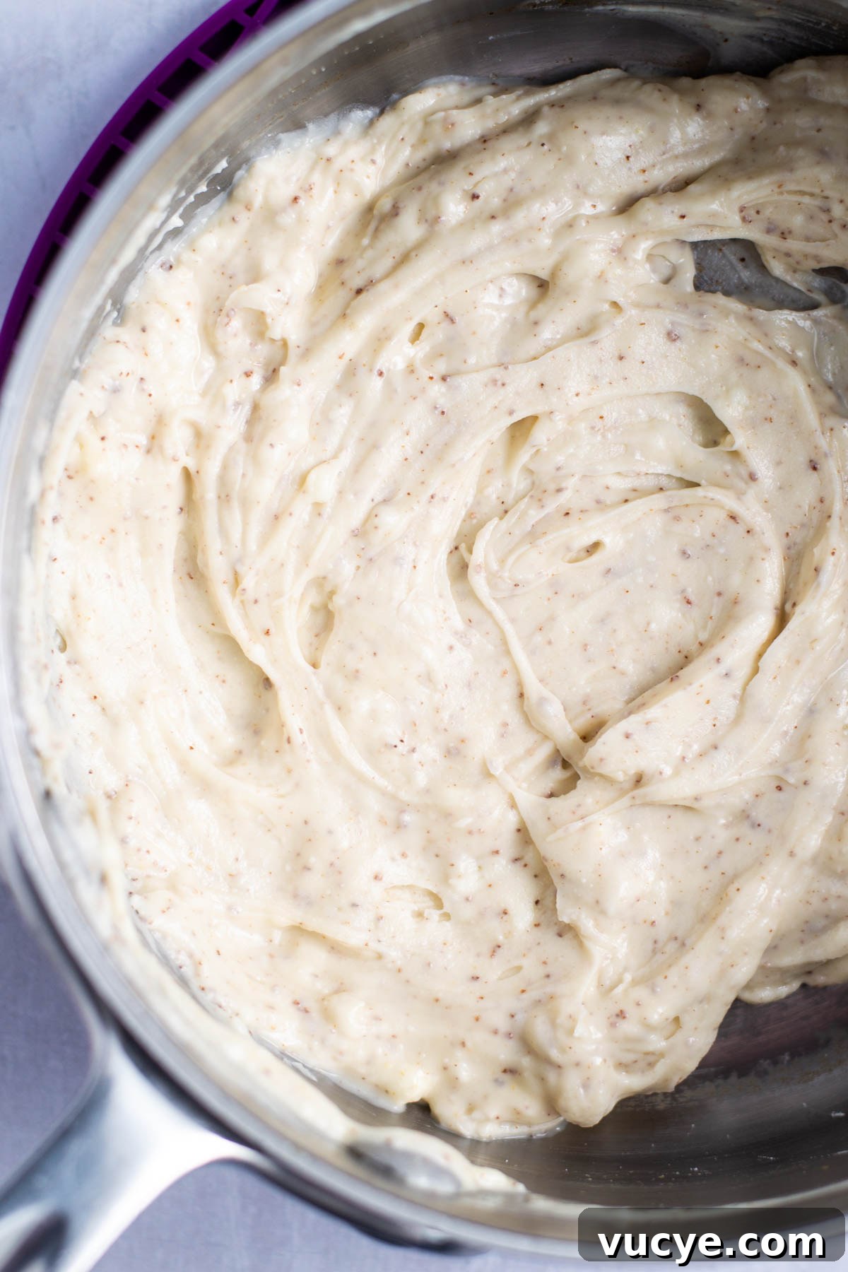 Moist Cardamom Cake Recipe with Warm Spices 10 brown butter frosting in saucepan