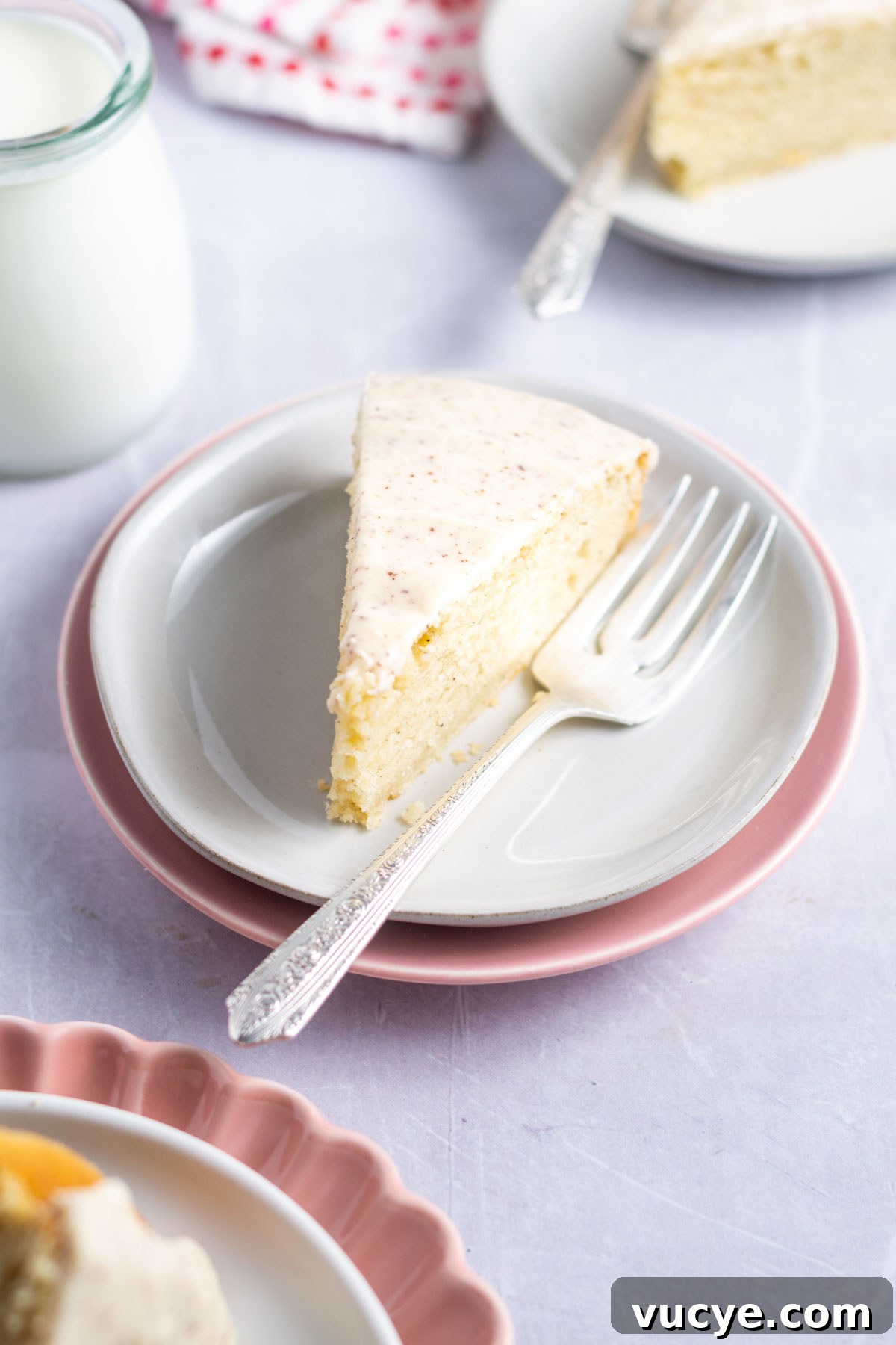 Moist Cardamom Cake Recipe with Warm Spices 5 slices of cardamom cake on plates