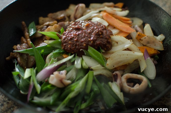 Spicy Pork and Squid Stir-Fry (Osam Bulgogi) Recipe 11 Pork, squid, veggies and sauce combined.