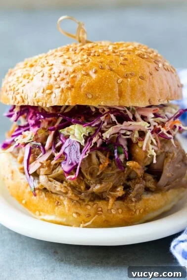 Chicken Parmesan Sliders Recipe: Crispy Mini Sandwiches for Parties 3 A pulled pork sandwich topped with slaw.
