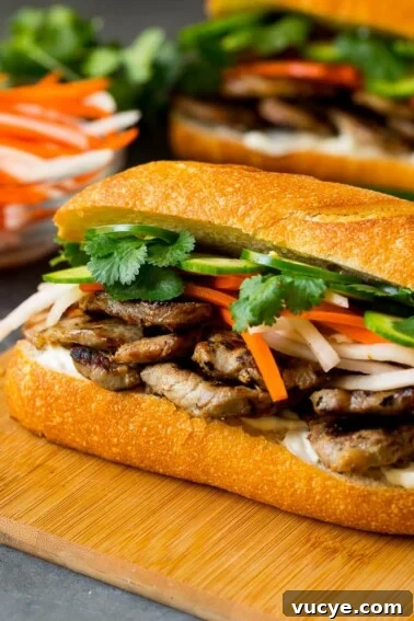 Chicken Parmesan Sliders Recipe: Crispy Mini Sandwiches for Parties 5 A bahn mi sandwich layered with pork, pickled vegetables and herbs.