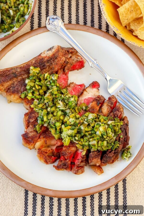 Grilled bone-in ribeye with charred salsa.