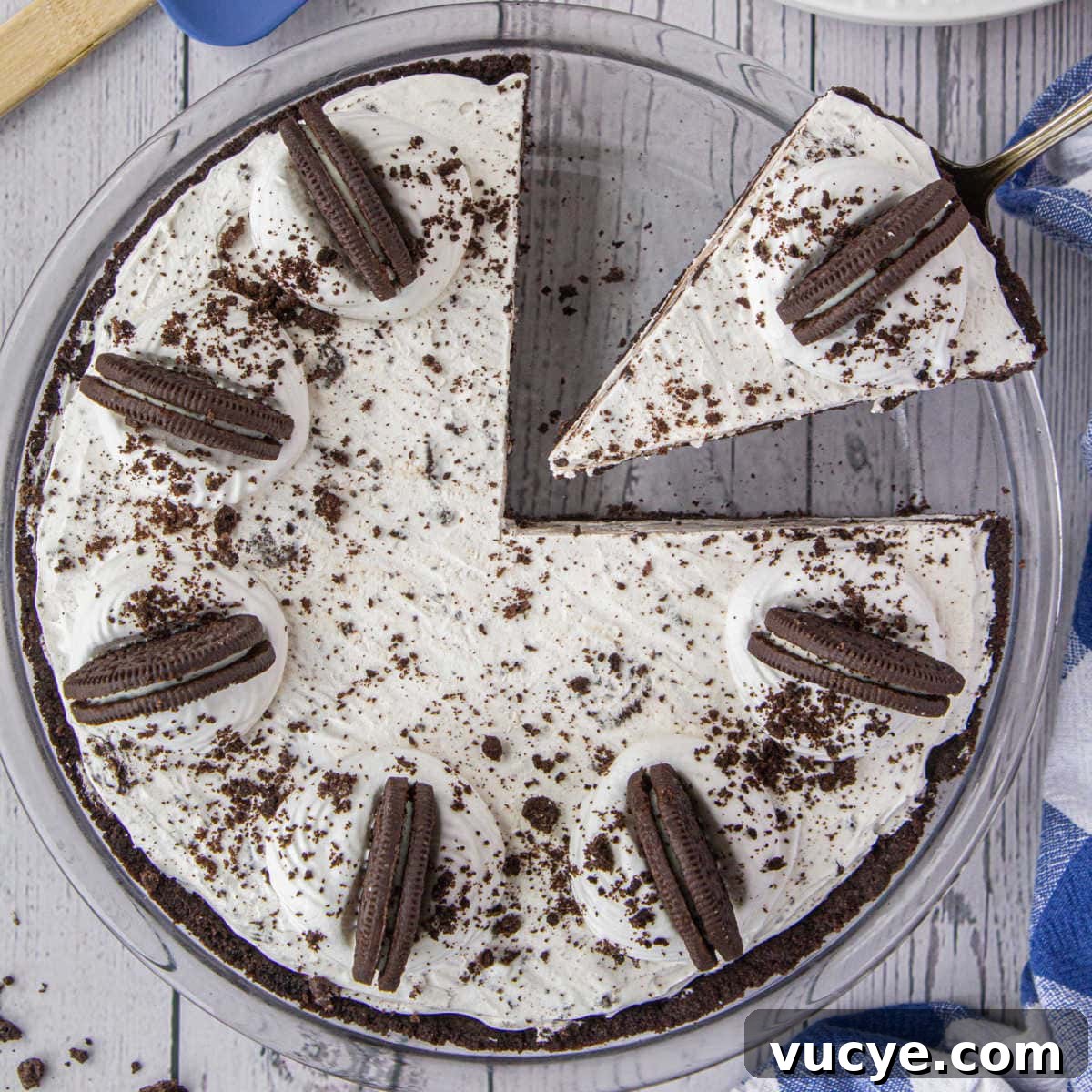 Overhead view of Oreo Icebox Pie being served from a pie dish.