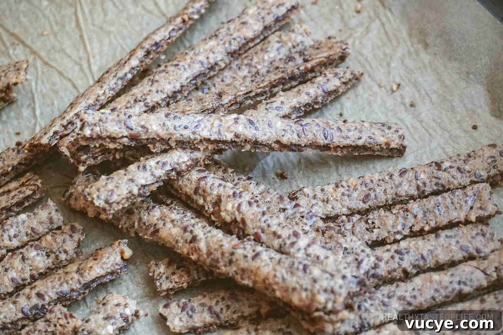 crunchy gluten-free quinoa cracker sticks made with seeds and walnuts