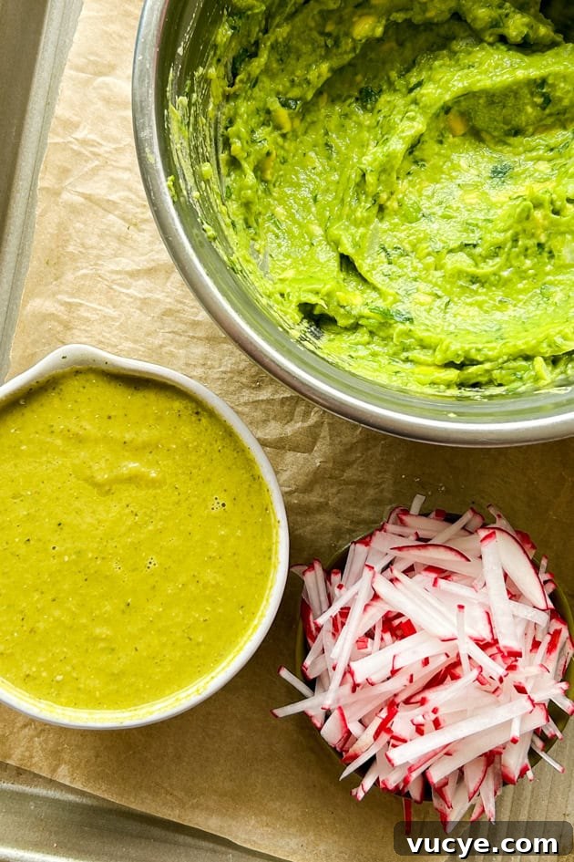 easy fish tacos toppings - radish, guacamole and salsa verde