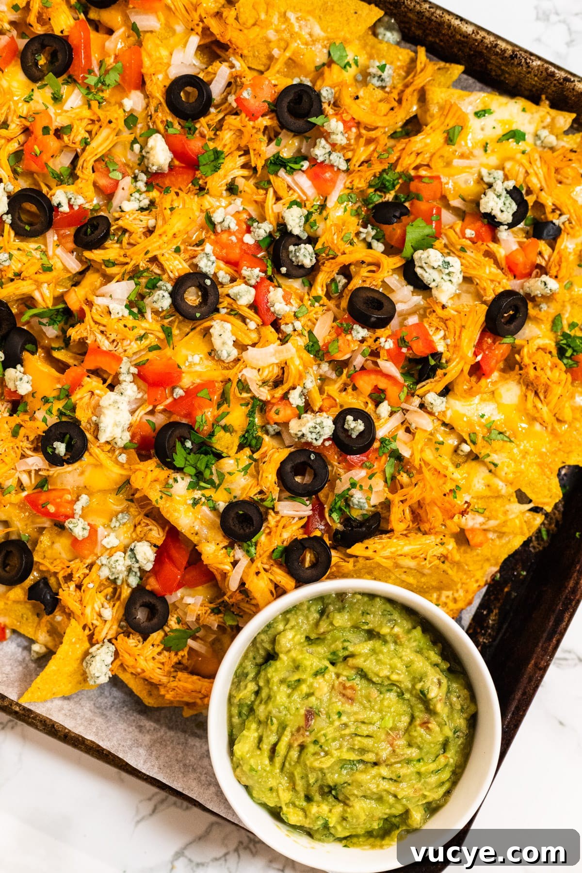 Buffalo chicken nachos on a sheetpan