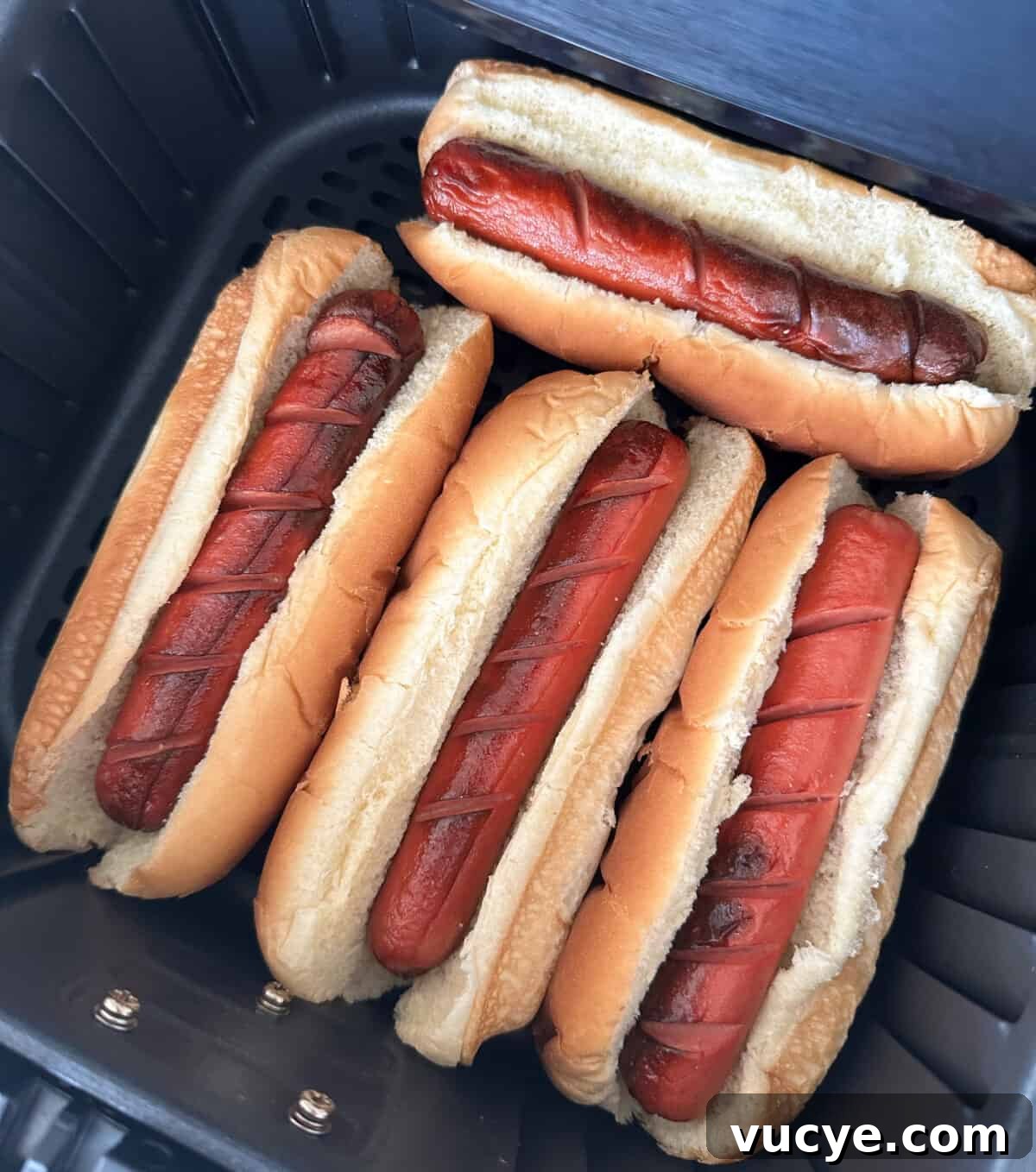 hot dogs in buns inside air fryer