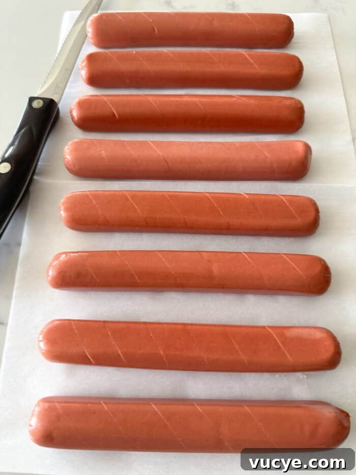 hot dogs with slits ready to cook